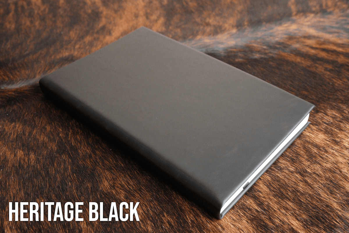 Heritage leatherette journal in black, shown blank before custom laser engraving