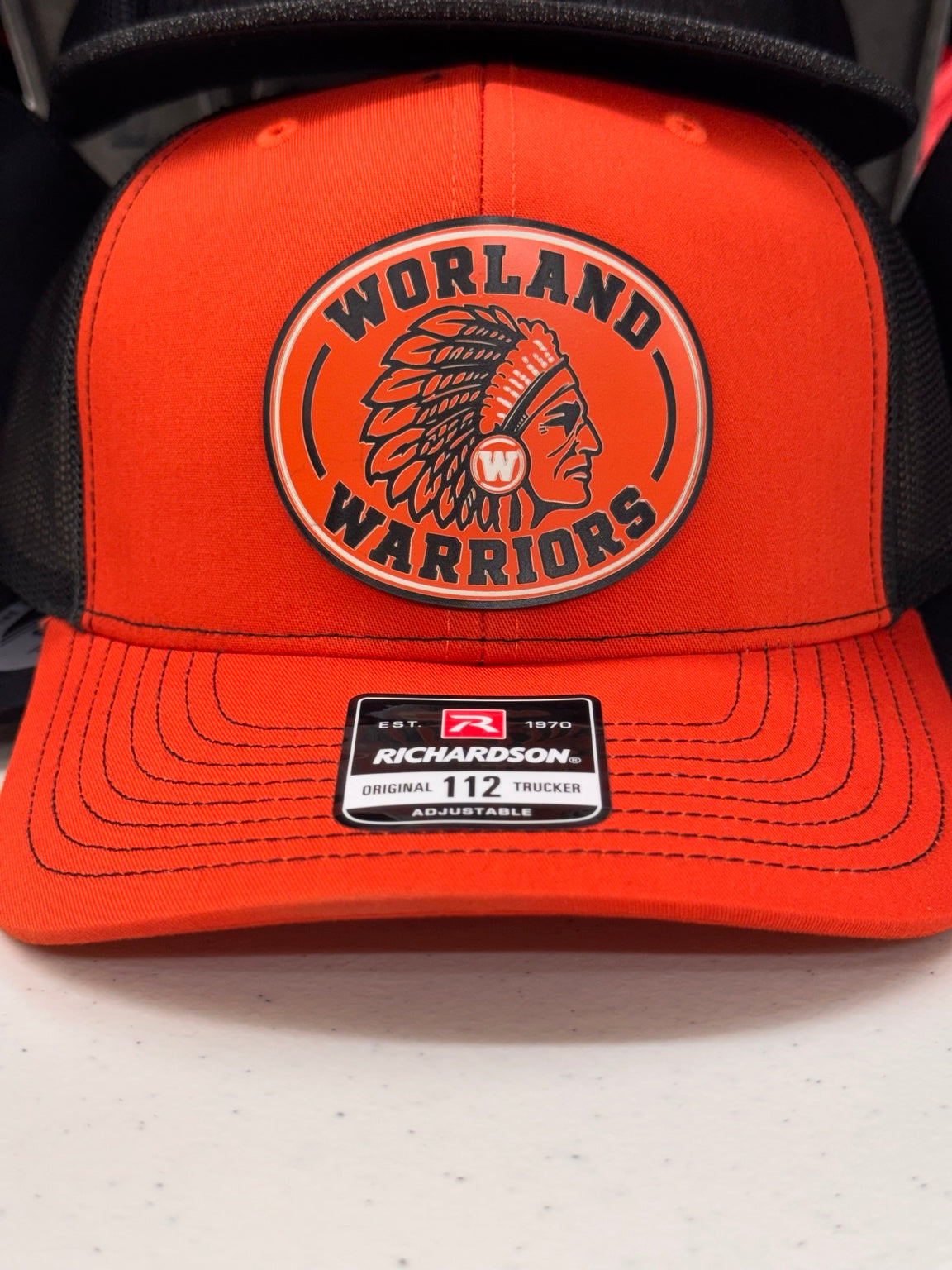 Worland High School Warriors orange Richardson 112 patch hat